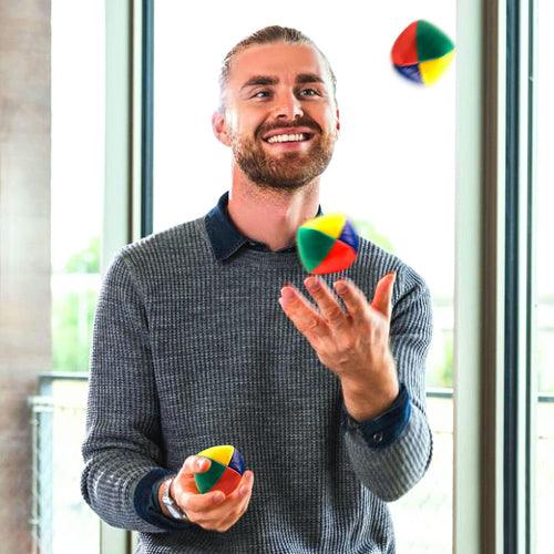 A man is playing Toy game of Juggling balls